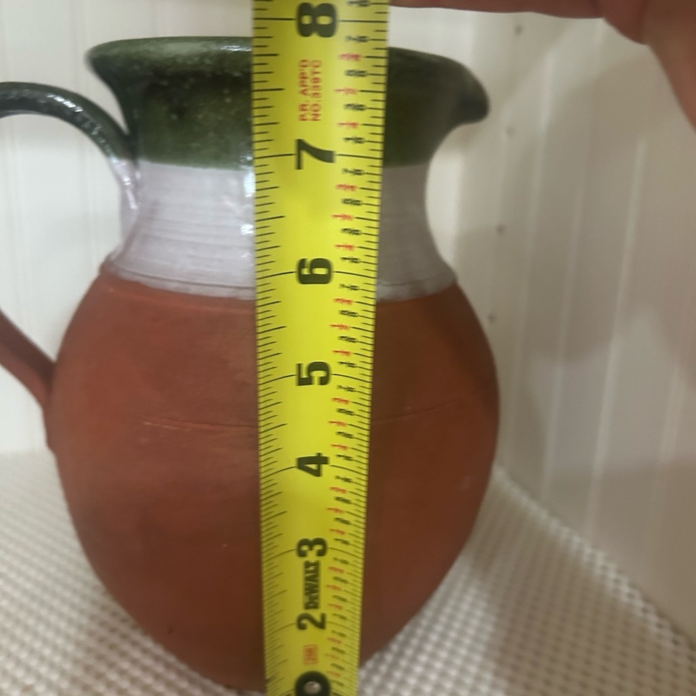 Handmade terracotta pitcher! Glazed inside for use.